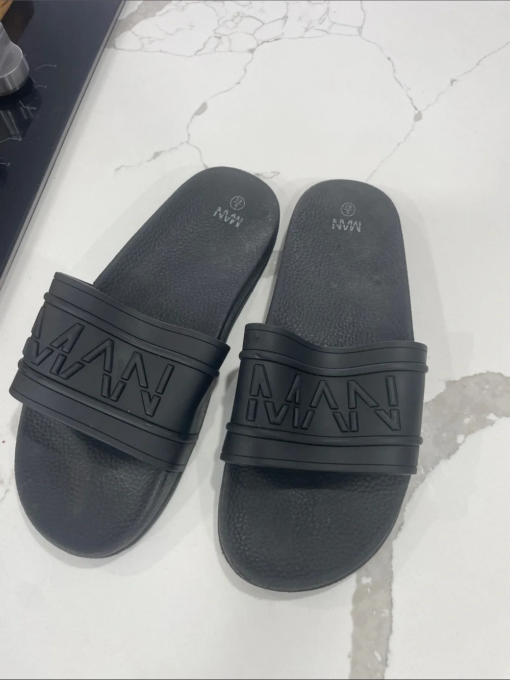 MAN Black Logo Slide Sandals